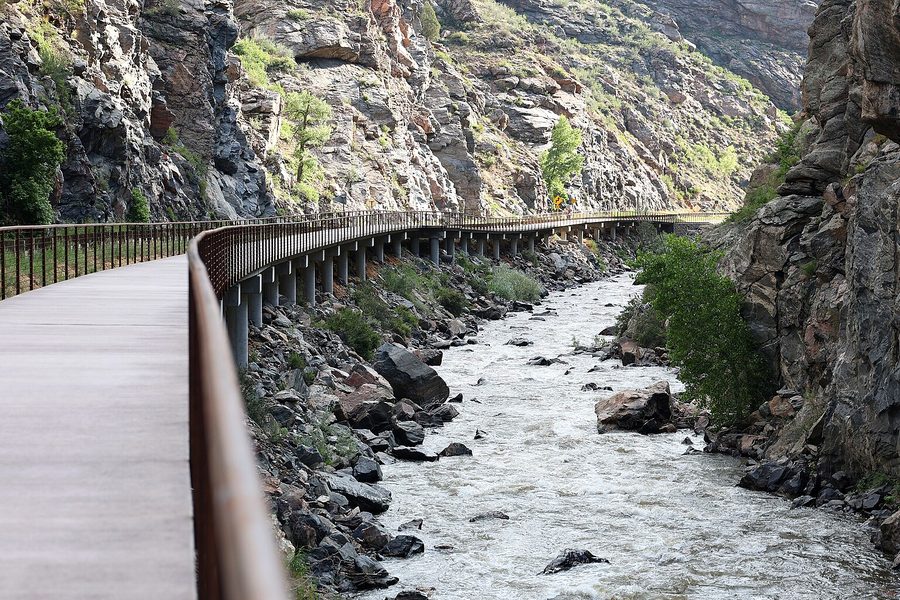 The paved Clear Creek trail running beside the creek through the canyon